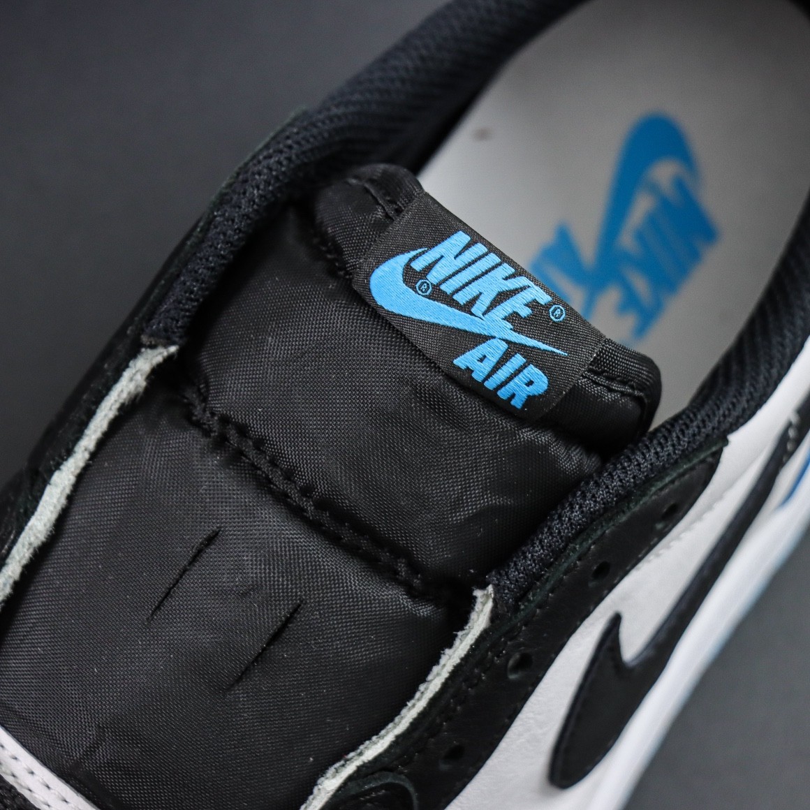 NIKE Air Jordan 1 Low Black and Dark Powder Blue 